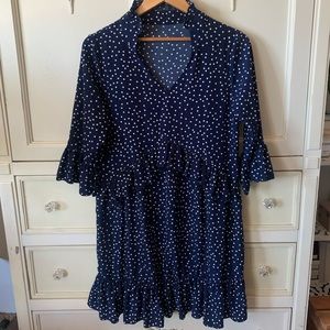 polka dot navy dress with ruffled detailing
